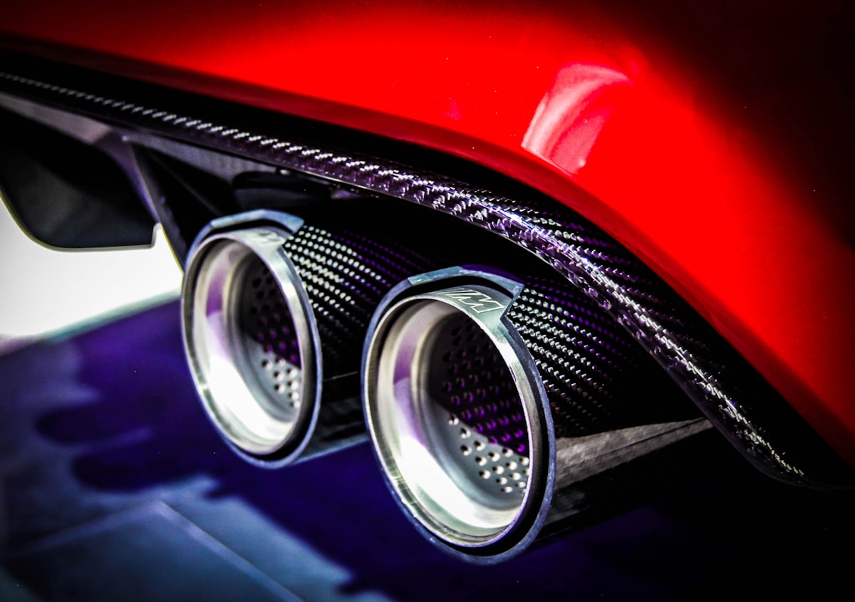 Polished dual chrome exhaust tips on a custom build